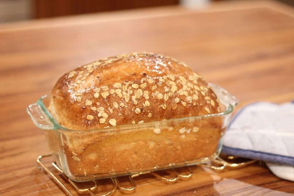 Homemade bread cooling in pan