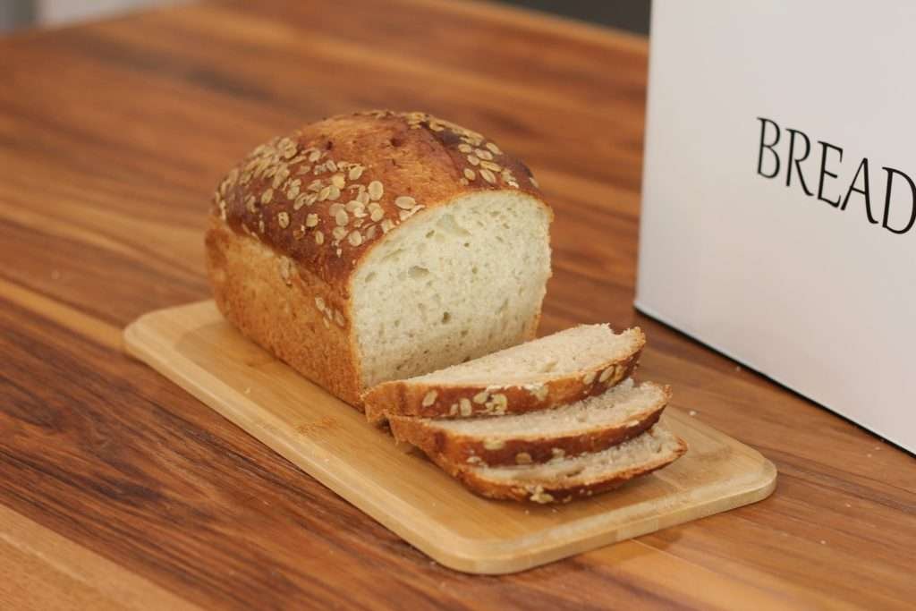 Homemade bread on cutting board sliced