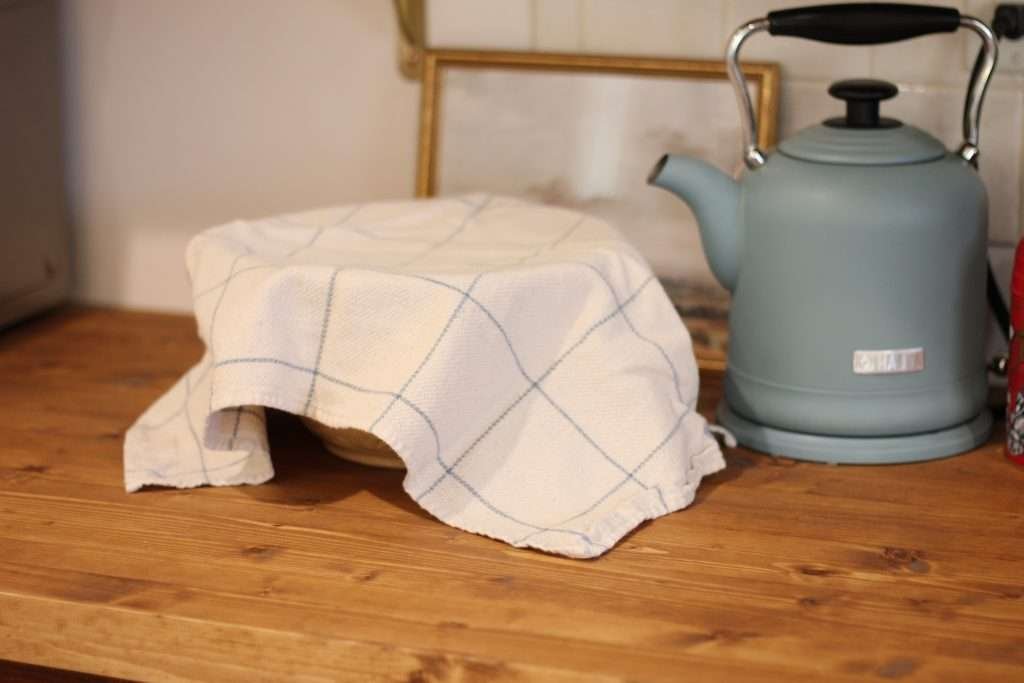 Bowl with tea towel over it