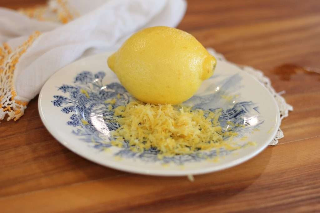 Lemon and lemon rind on plate