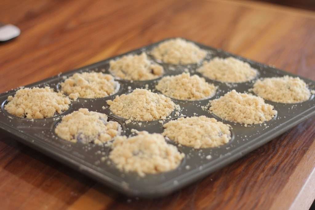 Sourdough Blueberry Lemon Muffins in pan