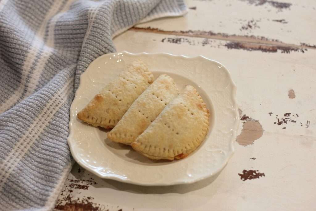 three hand pies on plate