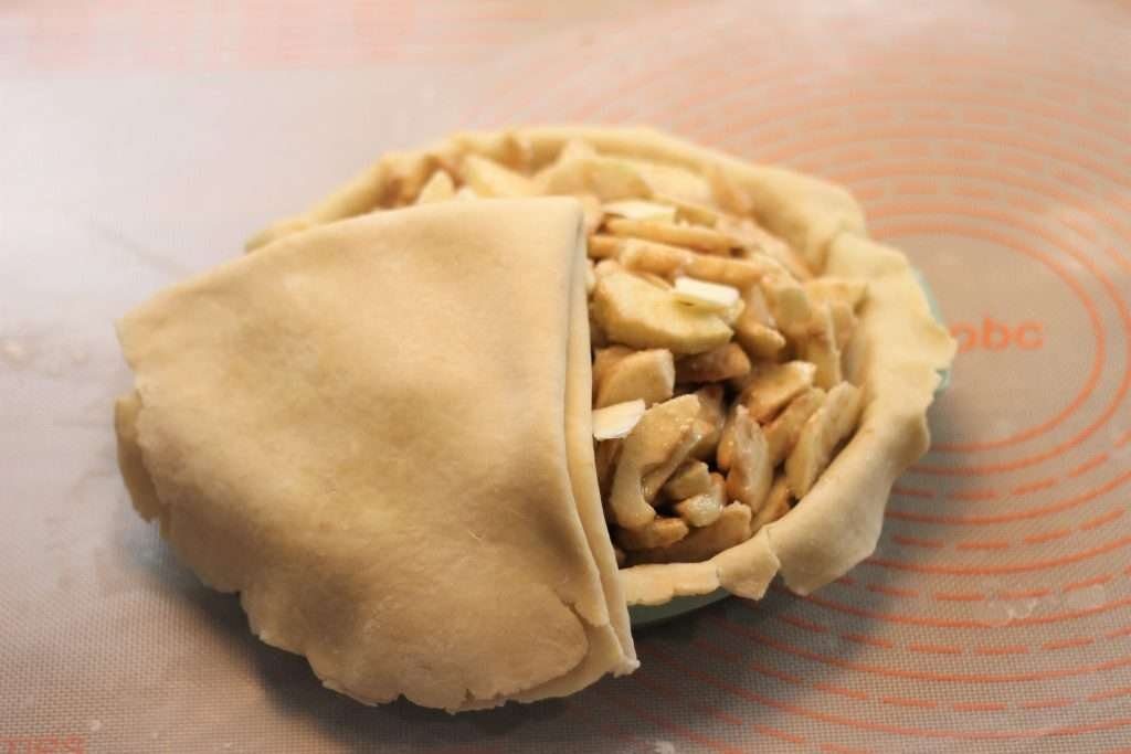 Sourdough pie crust on apple pie filling