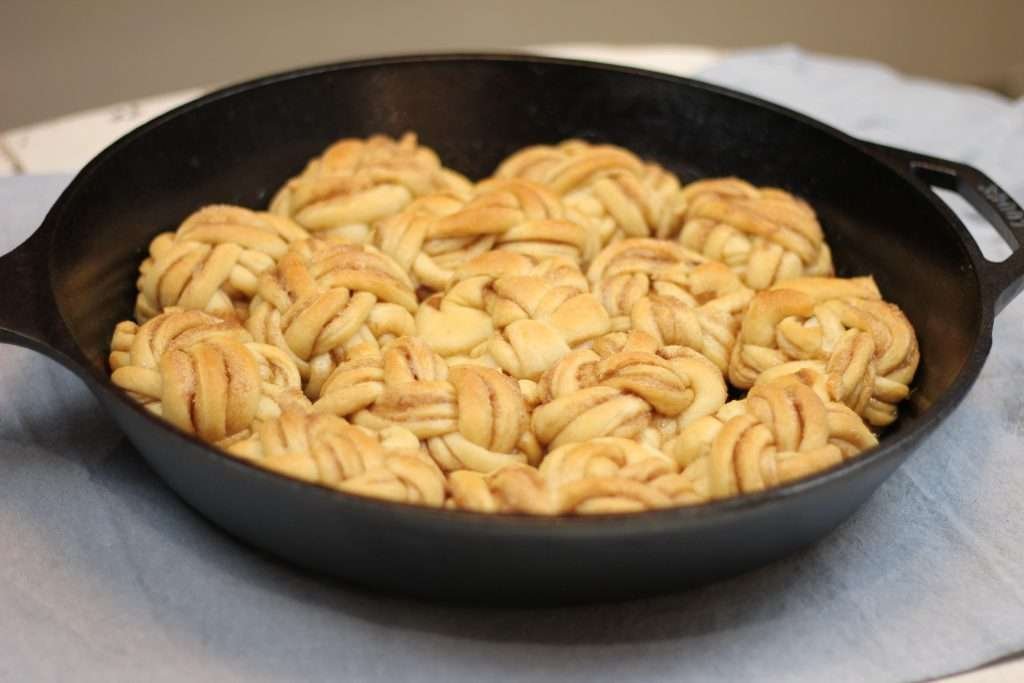 Sourdough Cinnamon roll twists in cast iron skillet