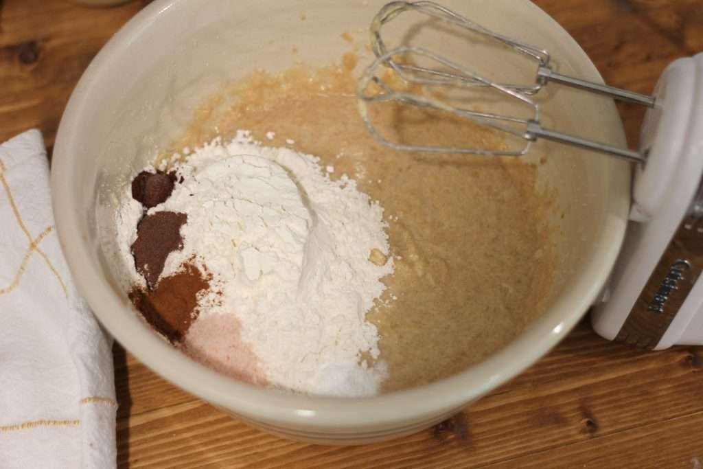 dry ingredients in bowl to be mixed in with wet ingredients for applesauce spice cake recipe with sourdough discard.